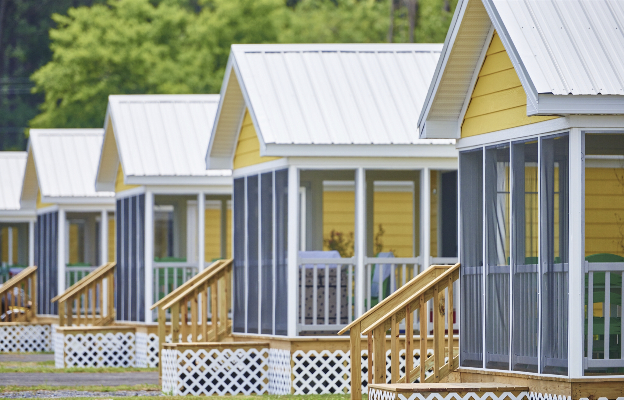 A row of park models with patios.