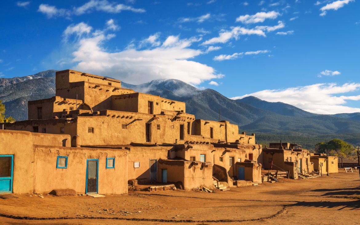Ancient dwellings of Taos Pueblo in New Mexico on sunny day