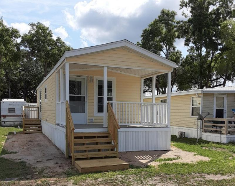 Yellow manufactured house.