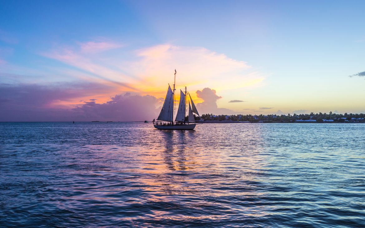 Sunset at Key West with sailing boat and bright sky