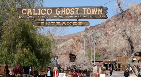A ghost town under the sun with sign proclaiming, "Calico Ghost Town."