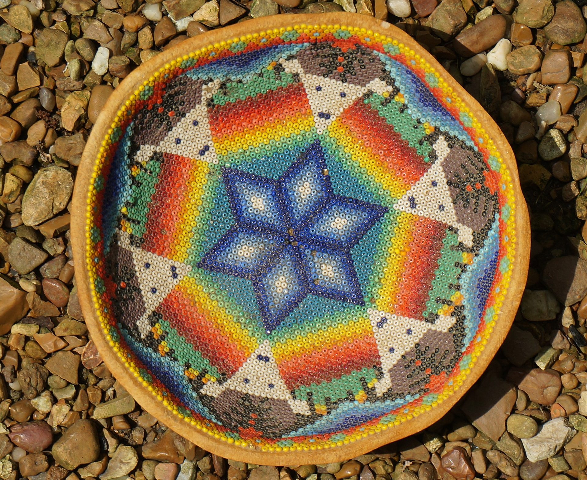 Colorful bead basket in the sun.