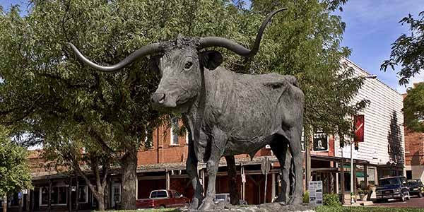 Large Longhorn statue in honor of the huge cattle drives of the 19th Century that made Dodge City.