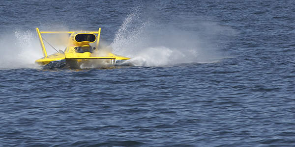 A yellow hydroplane in the water