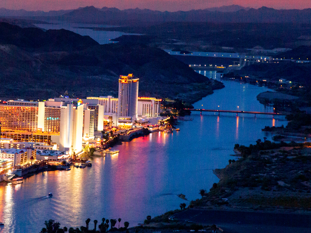 Image of bright casinos during evening on the river.