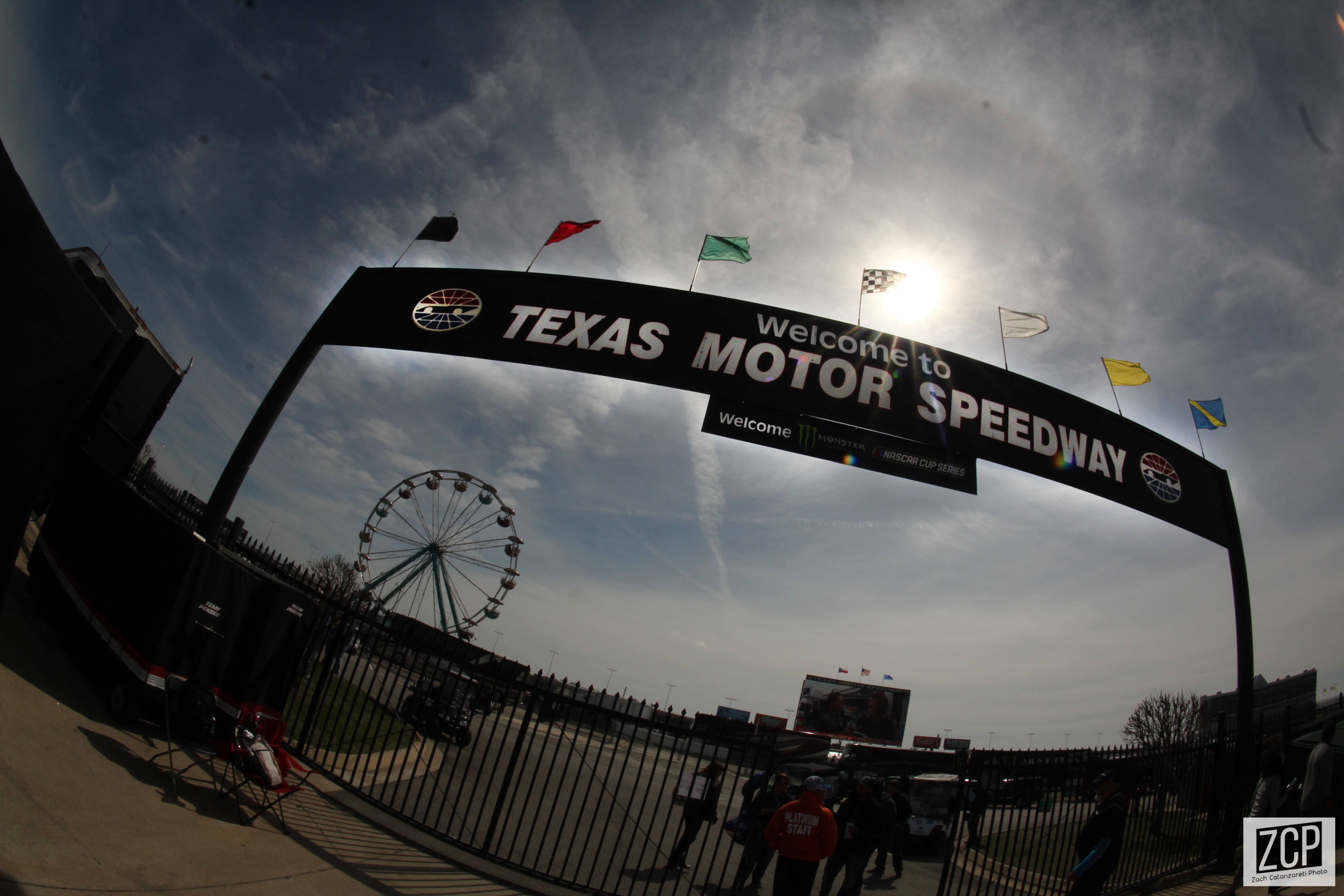 Sign emblazoned with "Texas Motor Speedway."