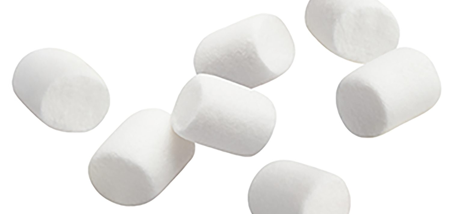 Flying marshmallows, isolated on white background