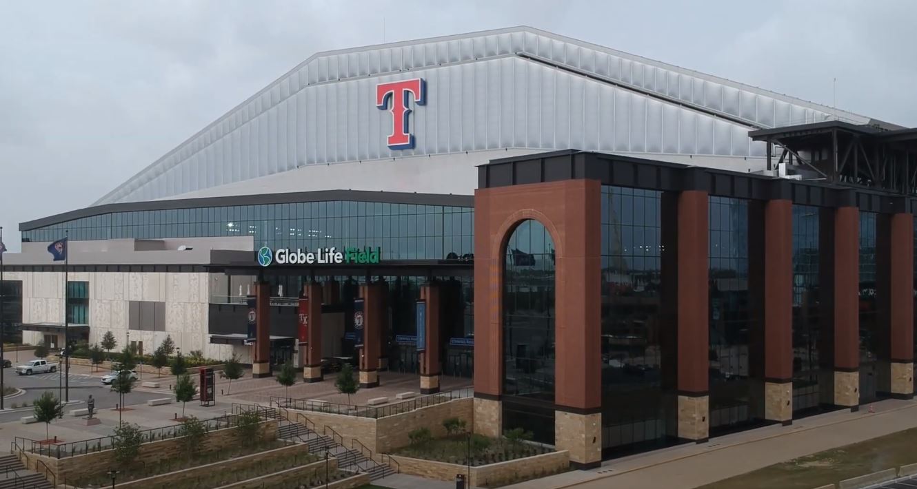 Globe Life Field Stadium with a big "T" emblazoned over the entrance.