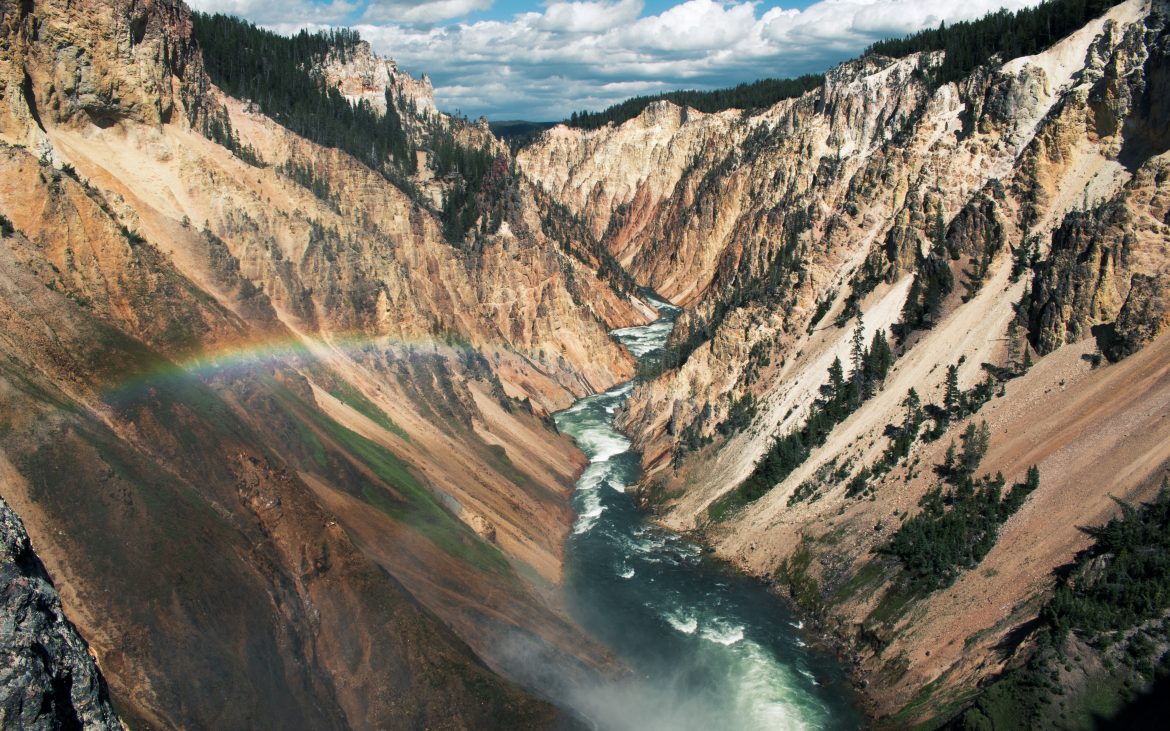 Creek through Yellowstone with rainbow