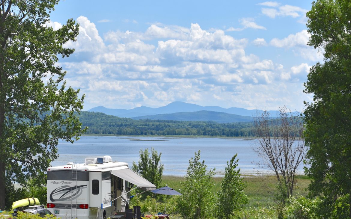 Best of Vermont's Recreation Opportunities — RV parked facing a vast lake.