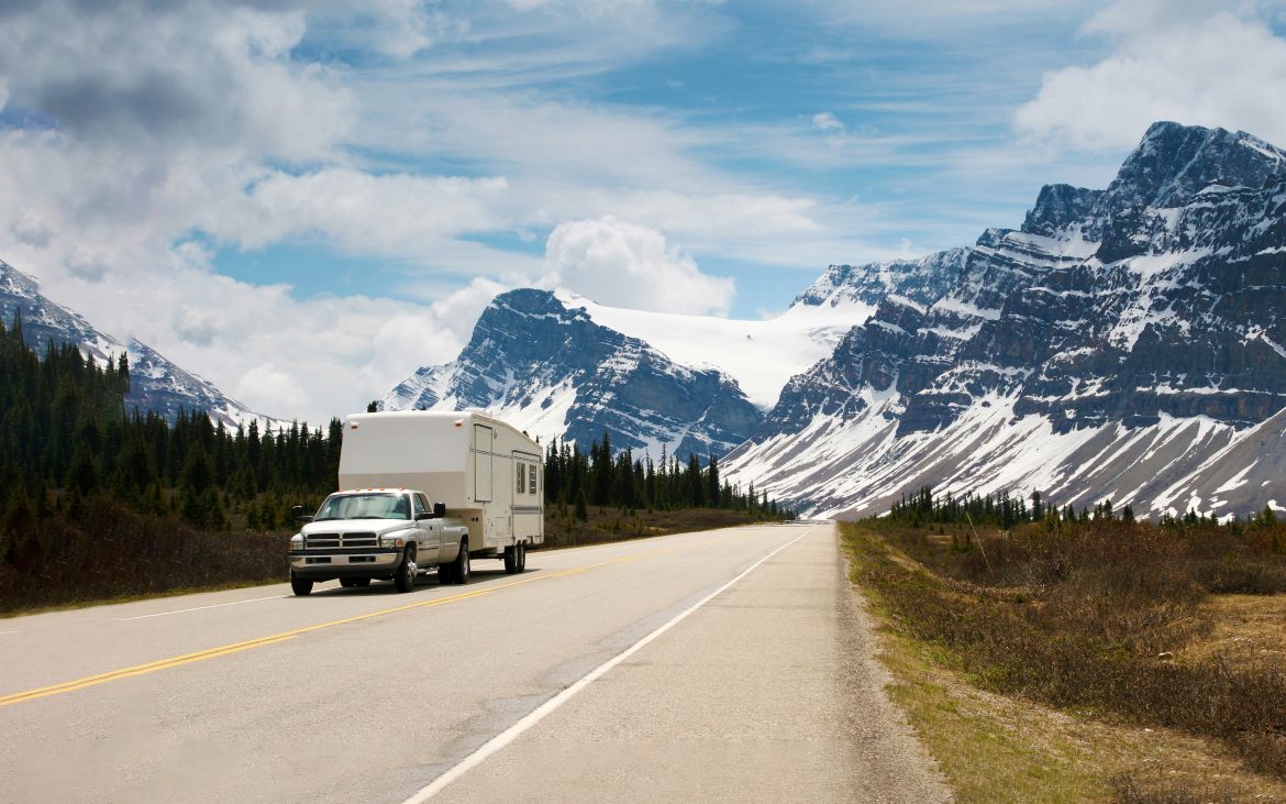 Summer of RVing — fifth-wheel rolling down a highway.