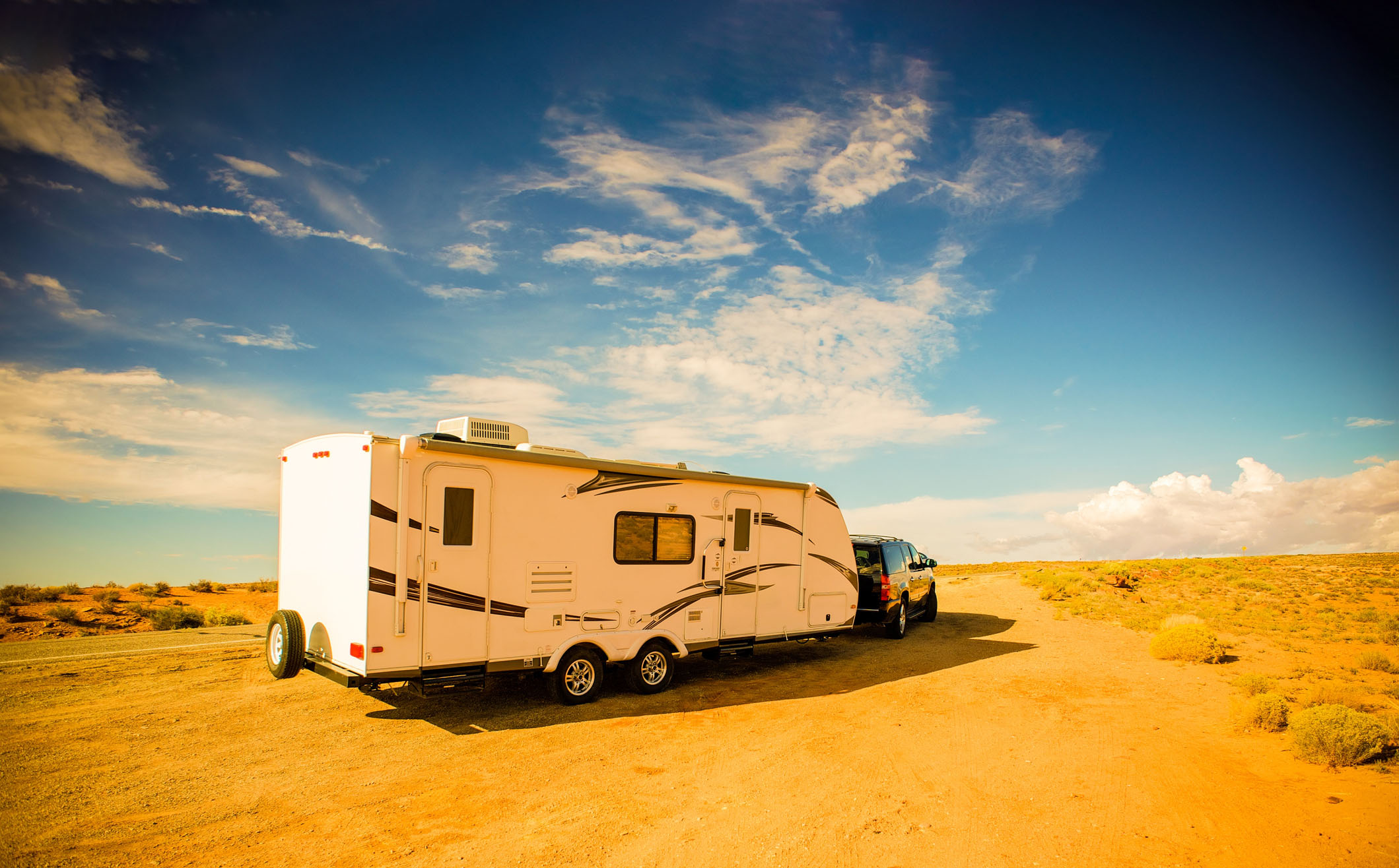 RV water Pressure — Travel Trailer in a sprawling flat desert