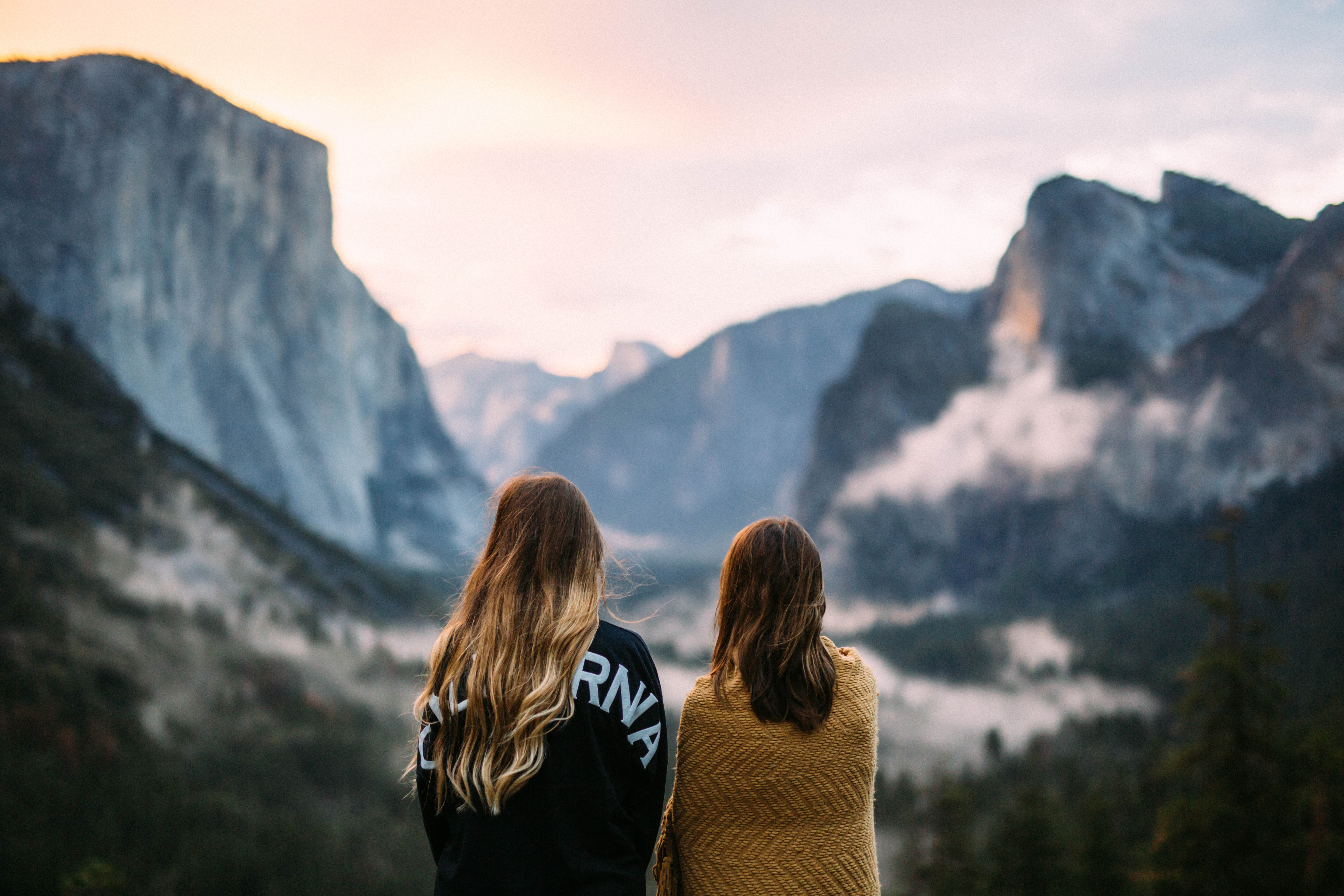 Two girls gazing at Tunnel View view