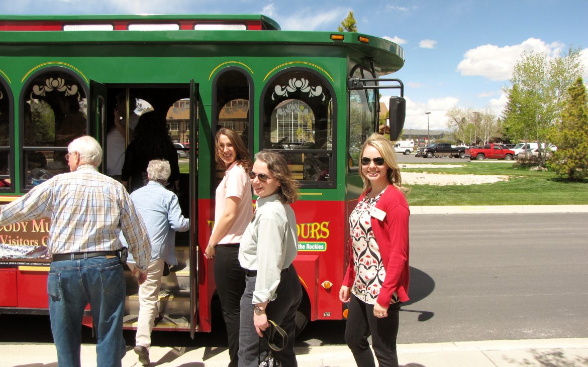 Cody in Wyoming — Passengers board a red and green trolley