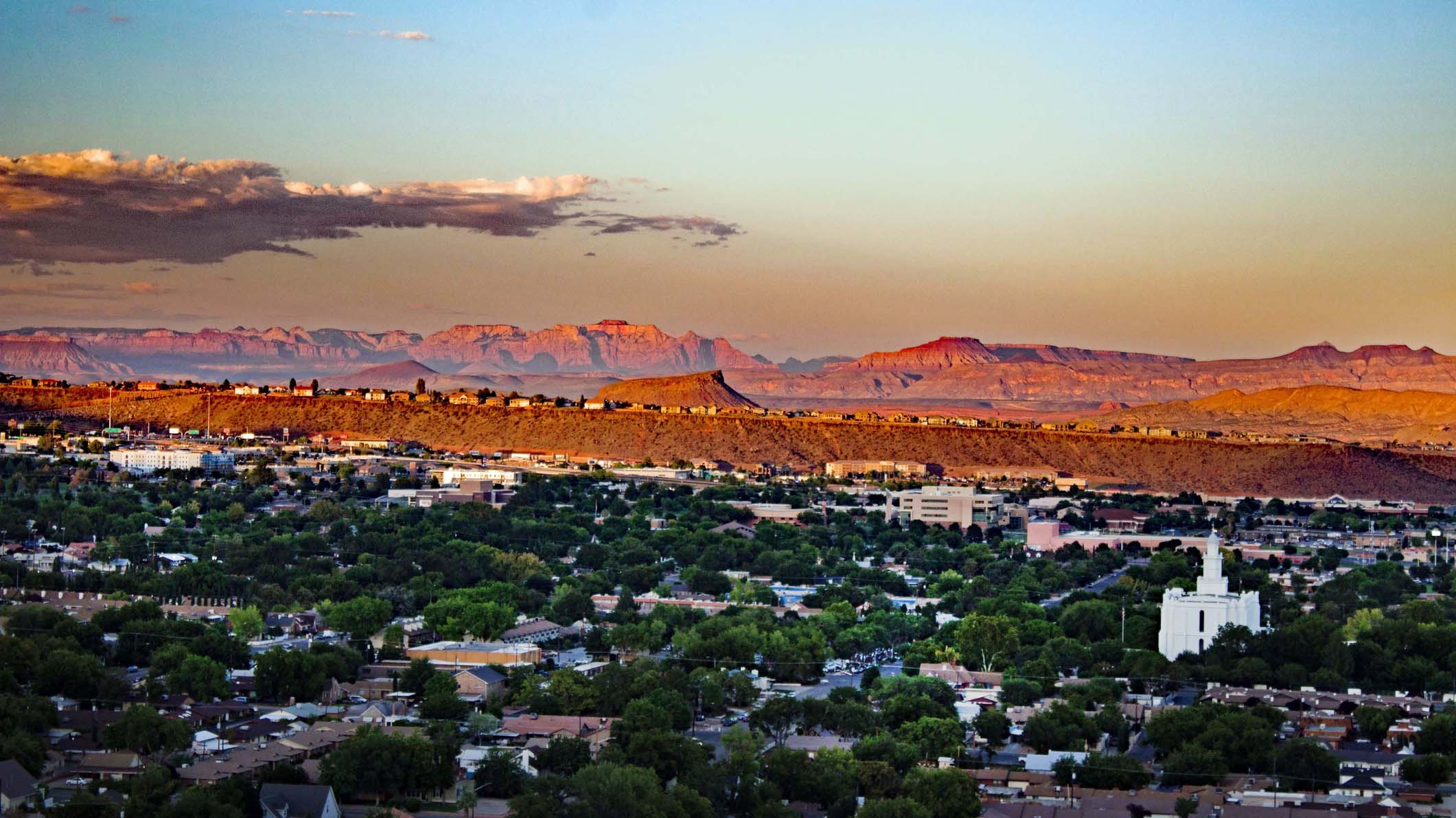 Aerial view of cityscape with temple in midst of small town.