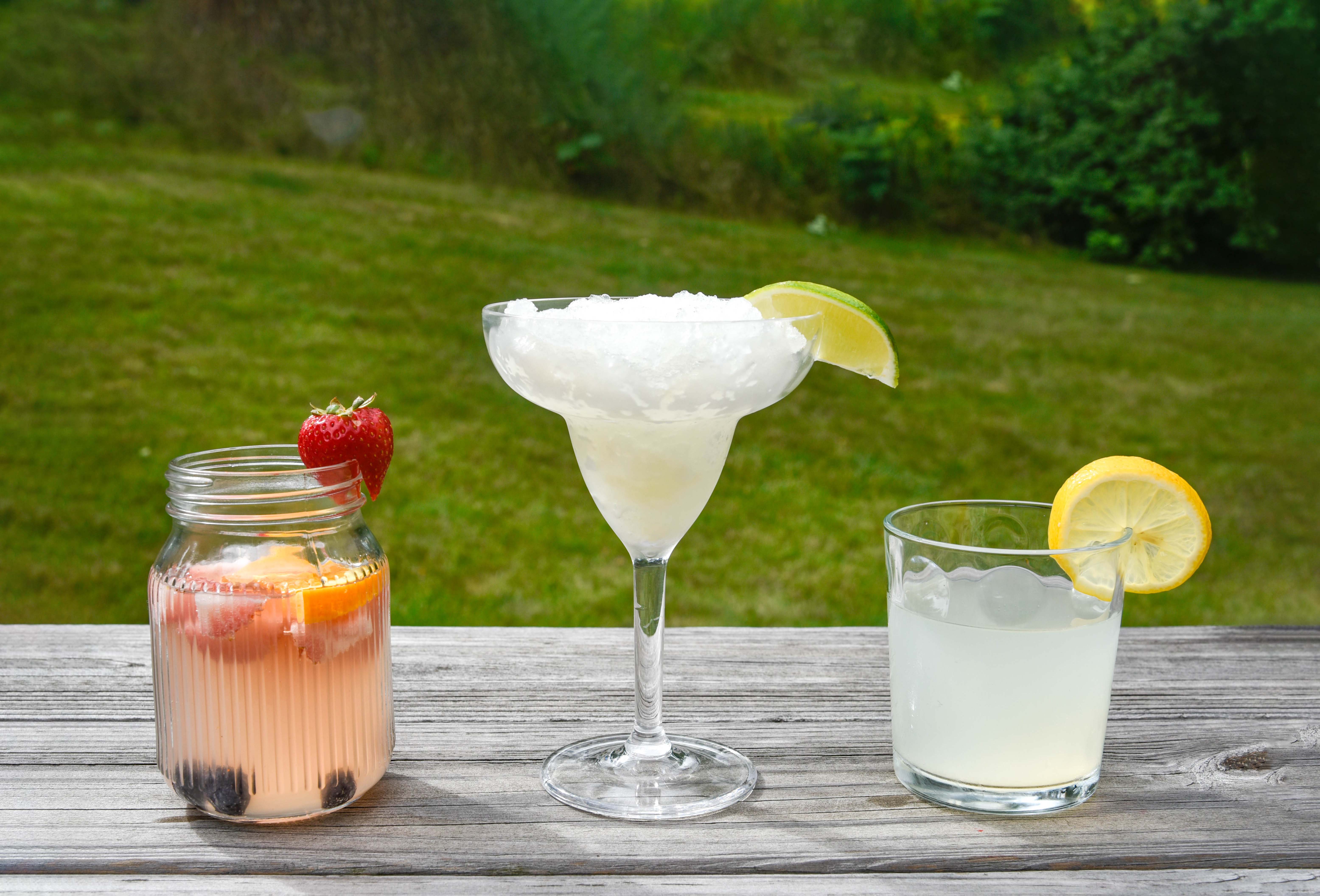 Camping Cocktails — three cocktails in a row, with margarita glass in the middle.