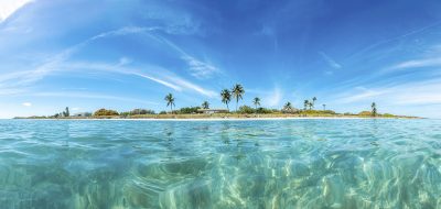 Panoramic picture of Sandspur Beach on Florida Keys in spring during daytime.
