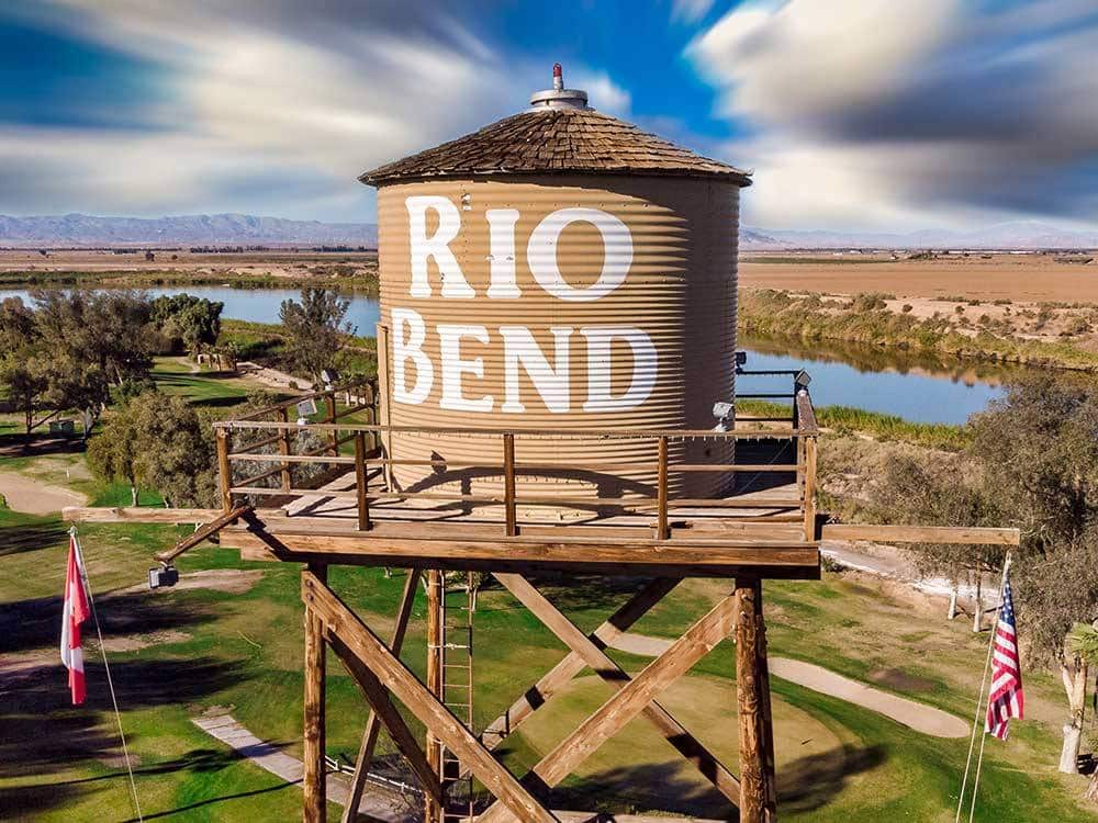Water tower with "rio Bend painted on the side. 