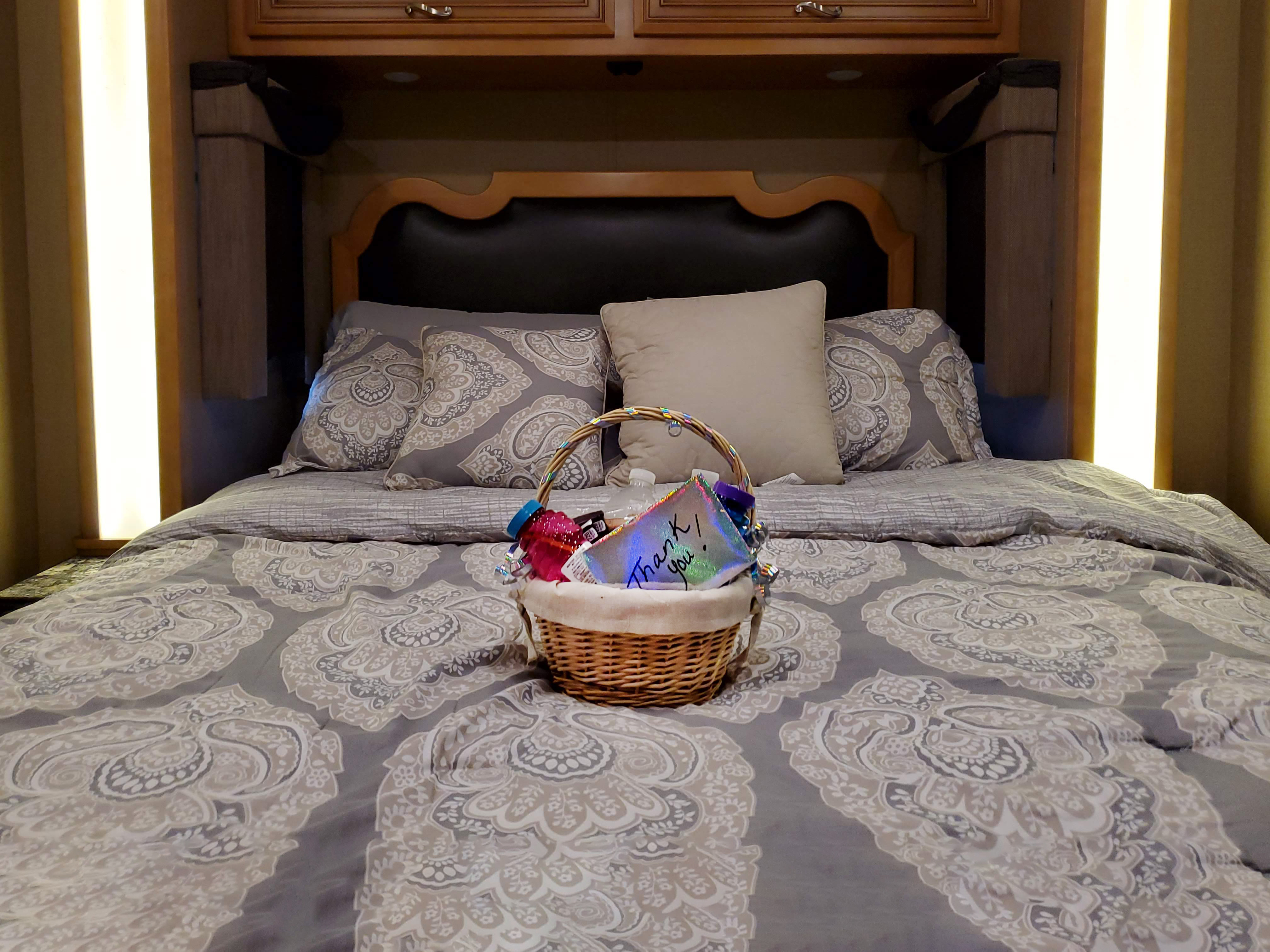 Gift basket for renters on bed