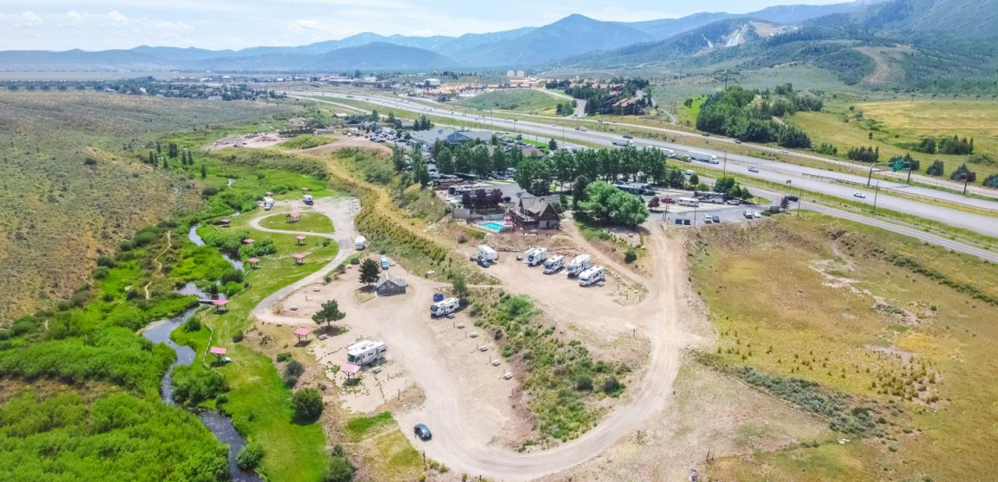 Aerial view of an RV park in a valley.