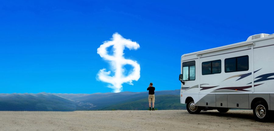 Camper looking at cloud shaped like a dollar sign in the distance.
