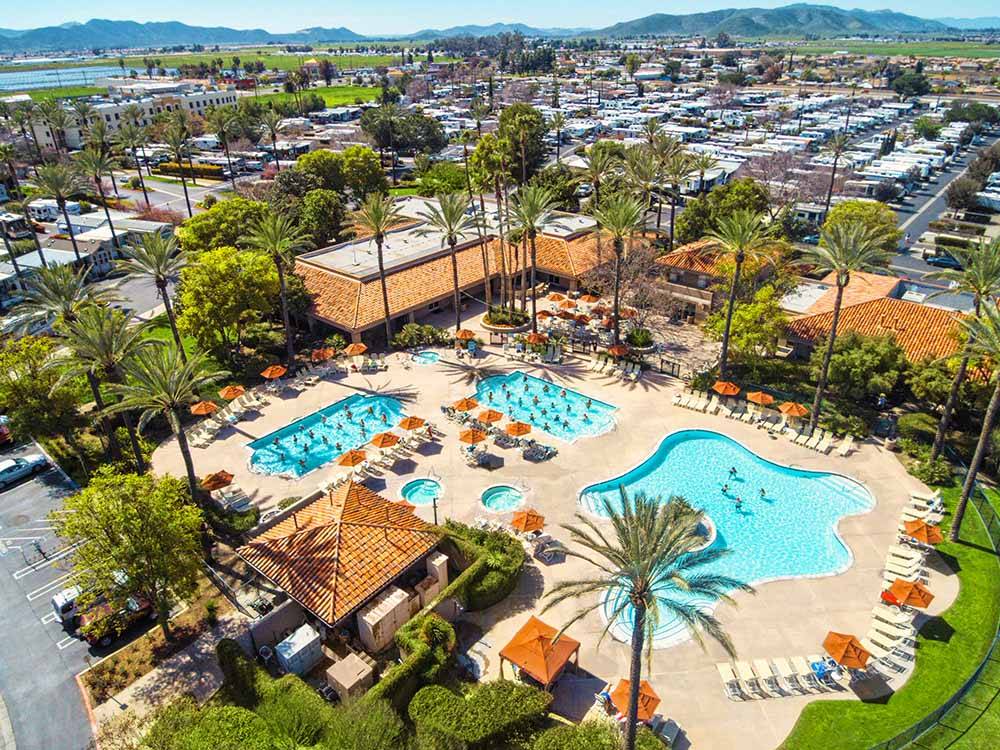 Aerial view of three pools in an RV resort.