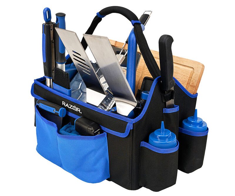 A blue and black caddy containing grilling utensils.