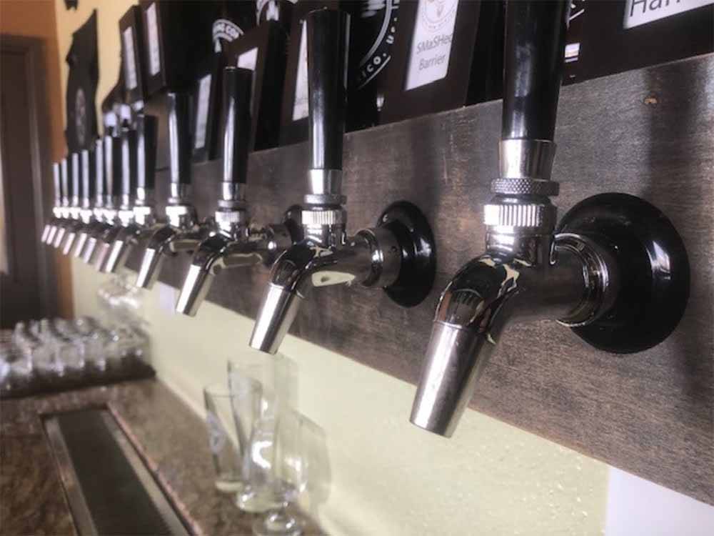 Row of beer taps.