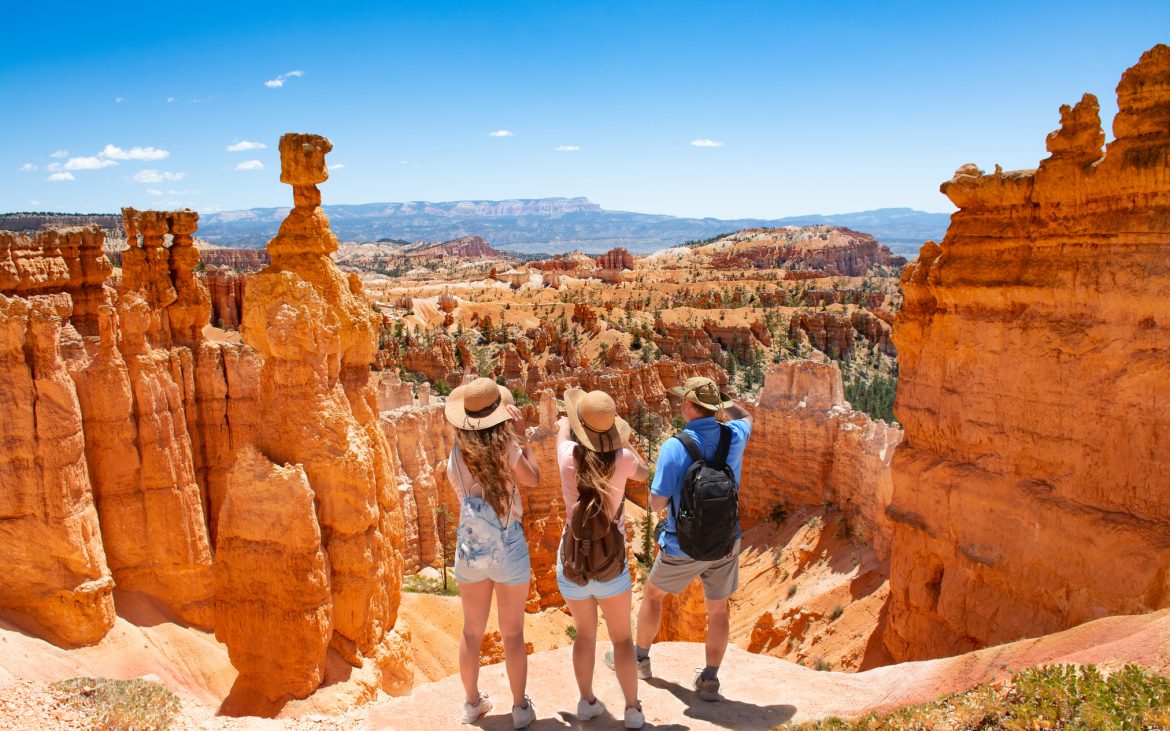 A family observes luminous landscapes in Bryce National Park.