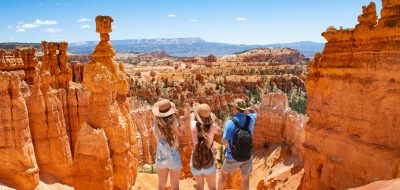 A family observes luminous landscapes in Bryce National Park.