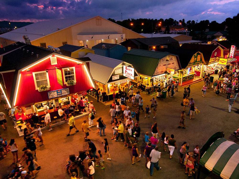 Crowded fairgrounds aerial view.