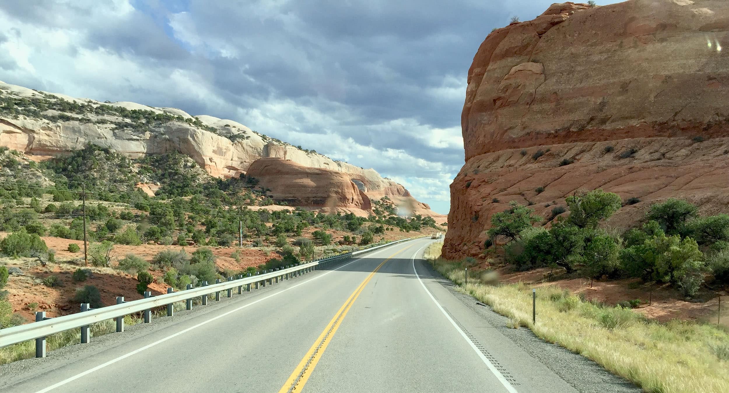 A highway winds through a rocky landscape.