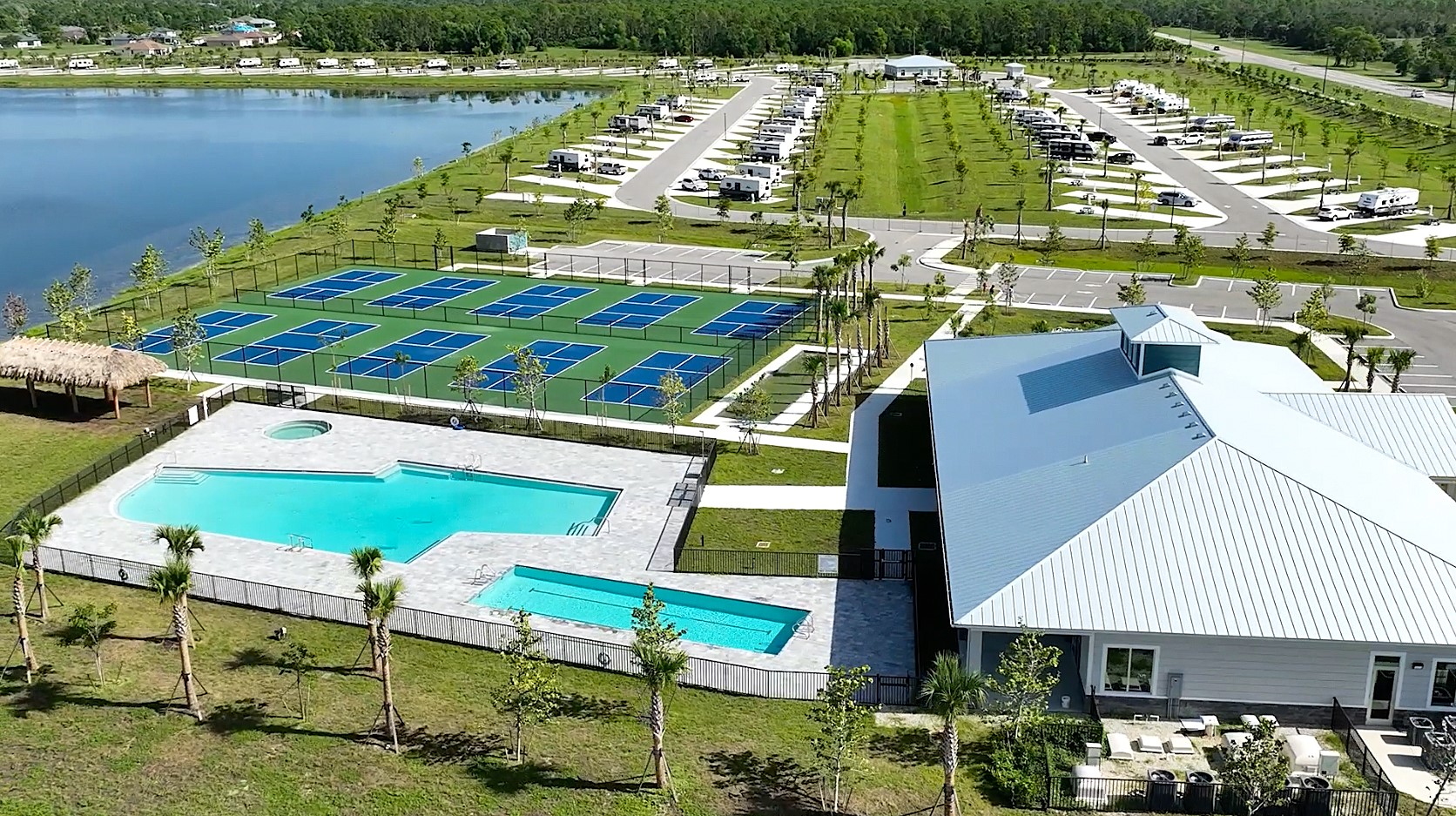 Aerial shot of RV sites, pickleball courts and pools